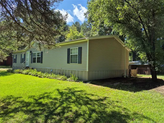 a view of a backyard with a garden