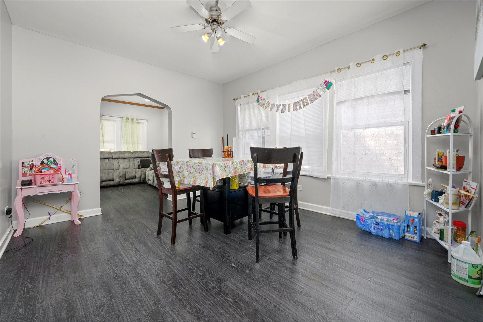 2016 East 93rd Street Chicago, IL 60617 - Photo 5 of 17 a living room with furniture and a wooden floor