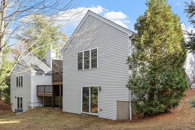 a view of a house with a tree