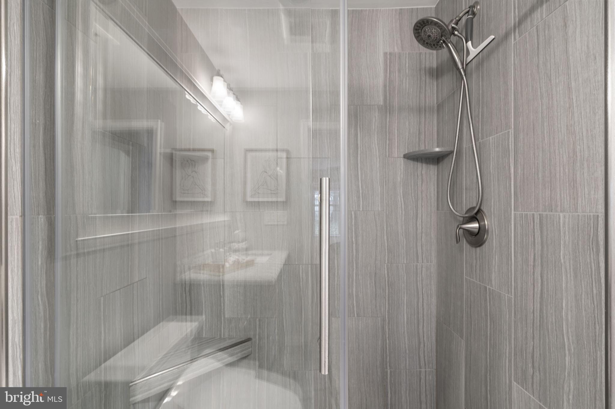 5575 Seminary Road, Unit 102 Falls Church, VA 22041 - Photo 19 of 31 a bathroom with a shower and toilet