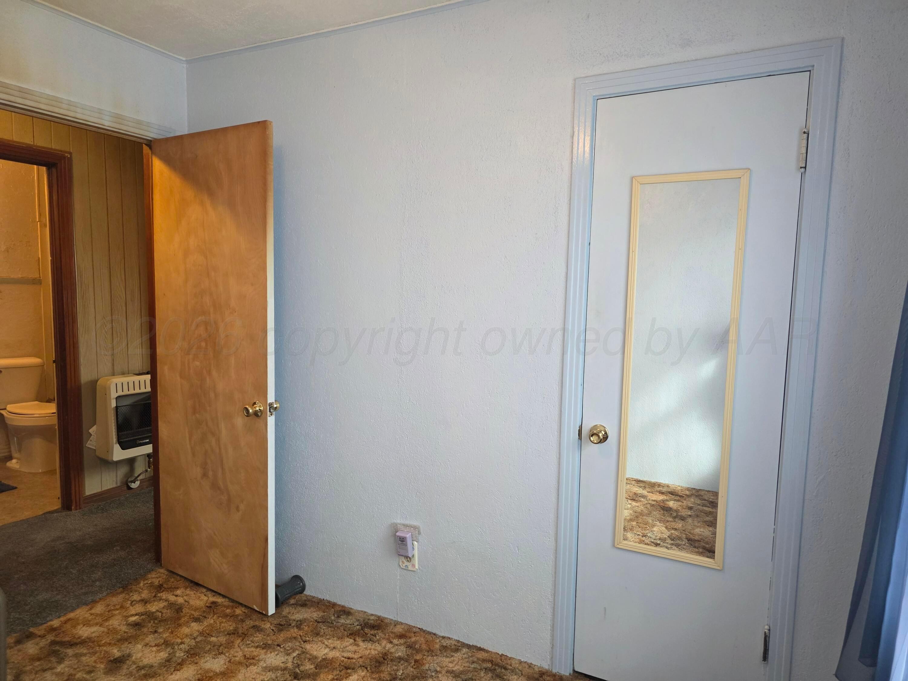 1812 Magnolia Street Amarillo, TX 79107 - Photo 13 of 27 a view of walk in closet
