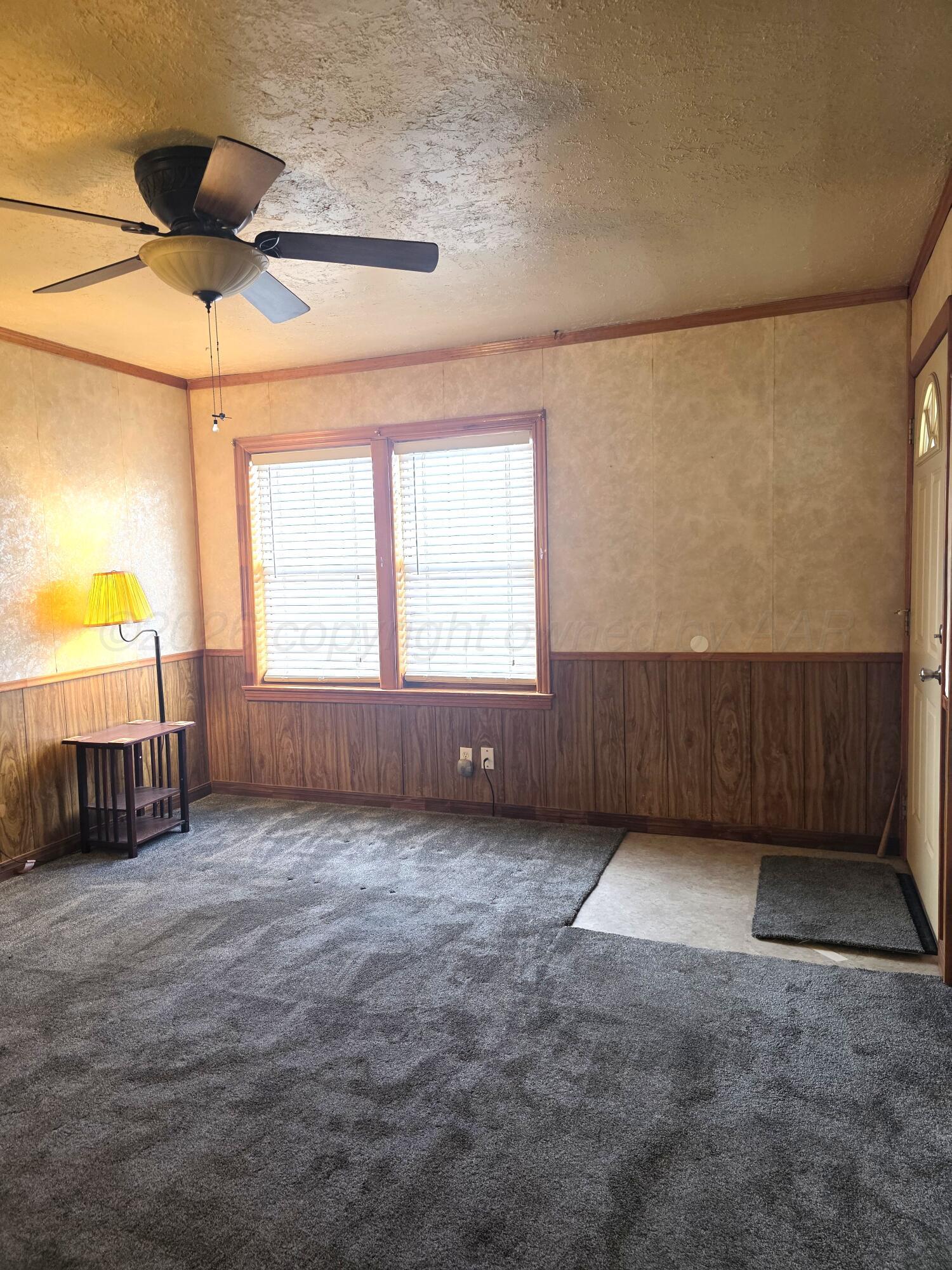 1812 Magnolia Street Amarillo, TX 79107 - Photo 4 of 27 a view of an empty room with a window