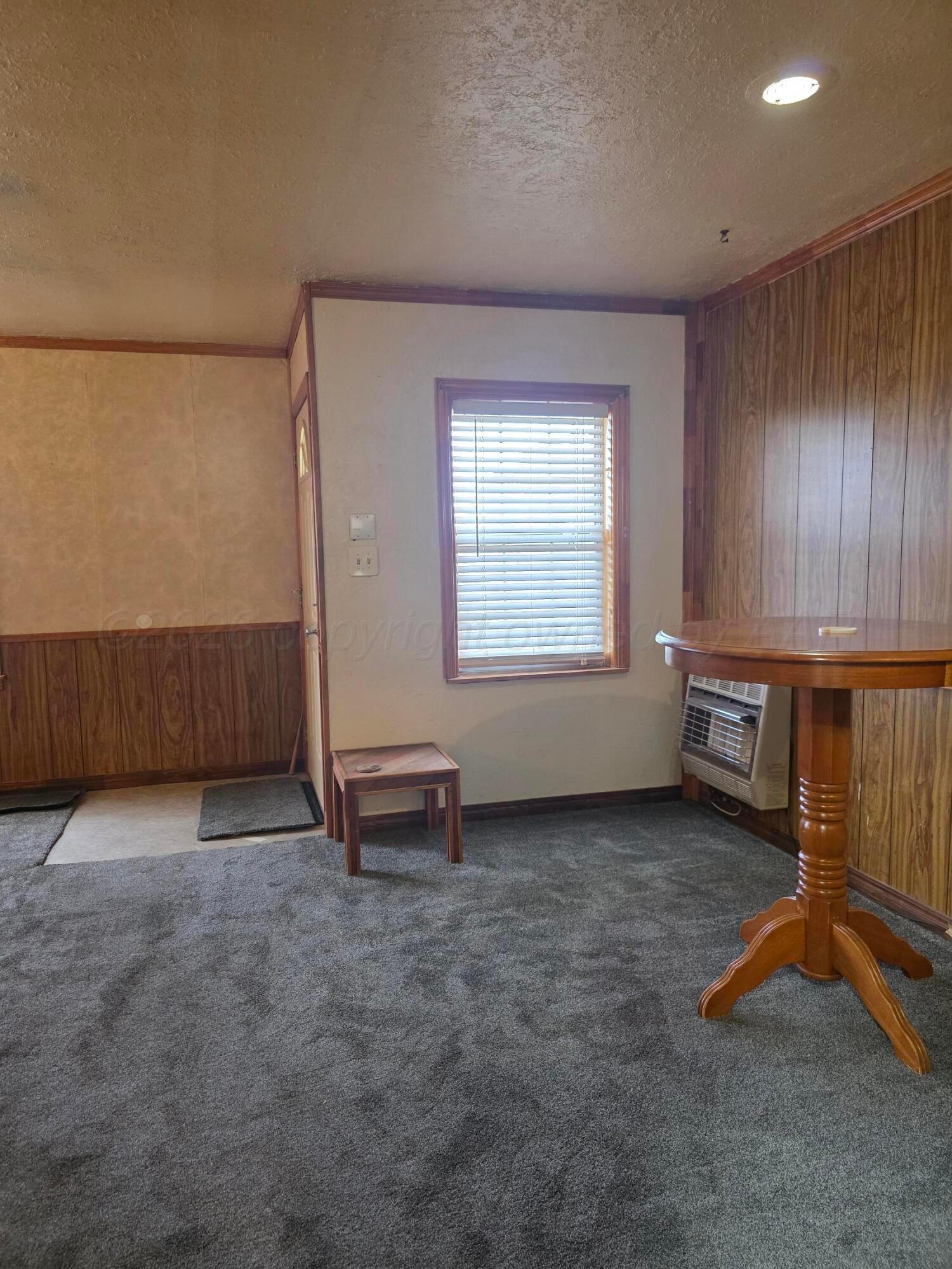1812 Magnolia Street Amarillo, TX 79107 - Photo 5 of 27 an empty room with windows