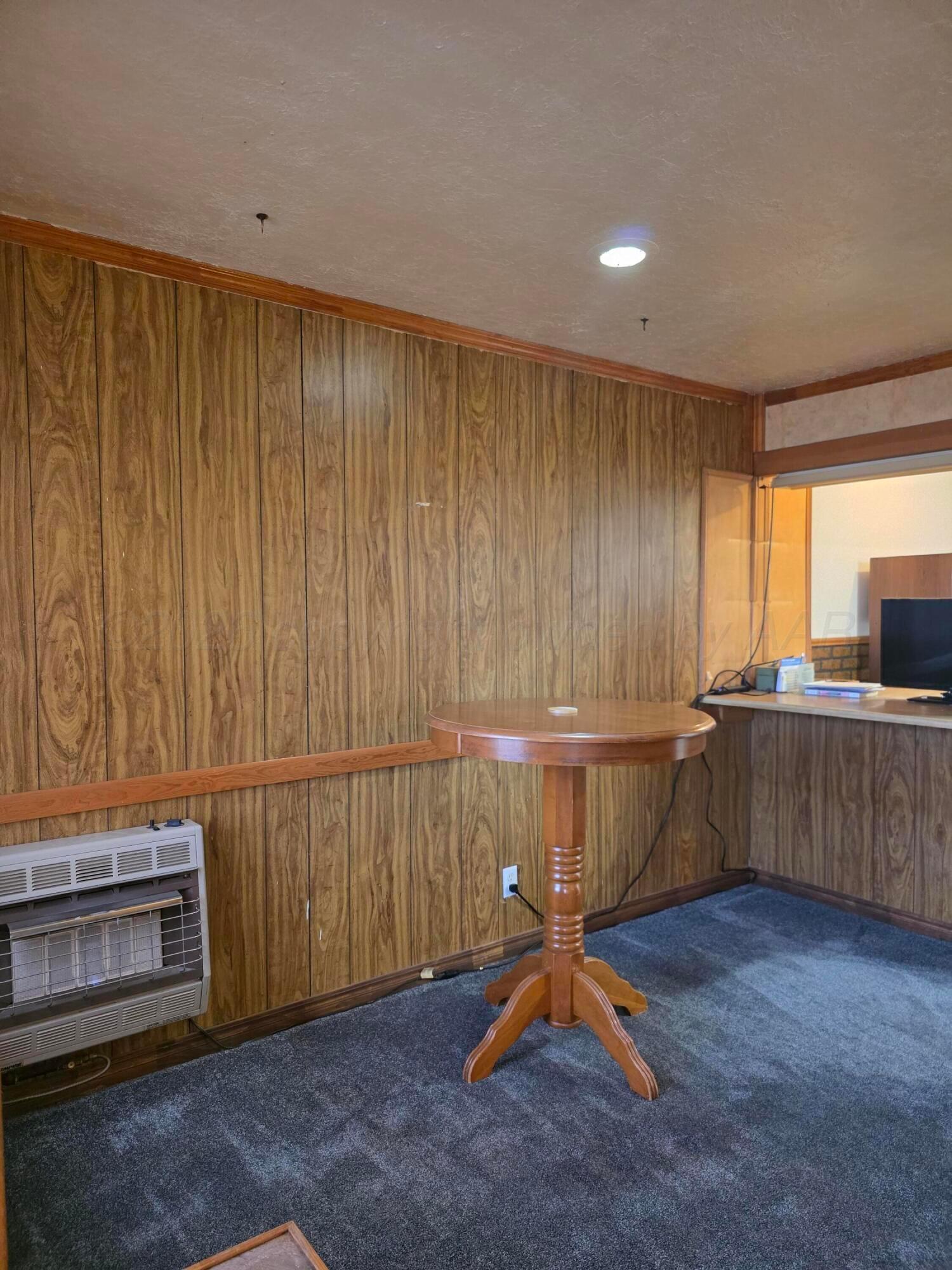 1812 Magnolia Street Amarillo, TX 79107 - Photo 6 of 27 a view of a room with gym equipment
