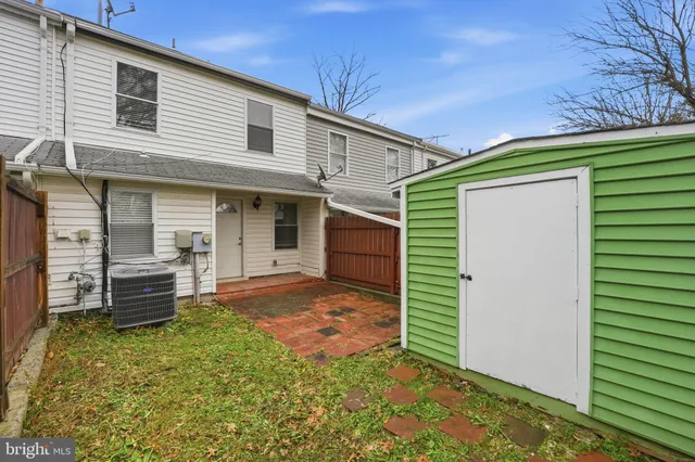 a view of a backyard with a garden