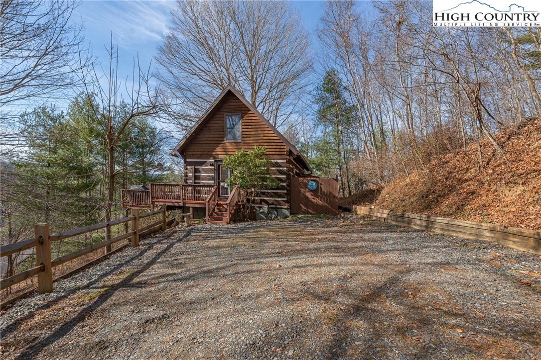 419 Billy Billings Road Vilas, NC 28692 - Photo 41 of 50 a view of a house with a yard