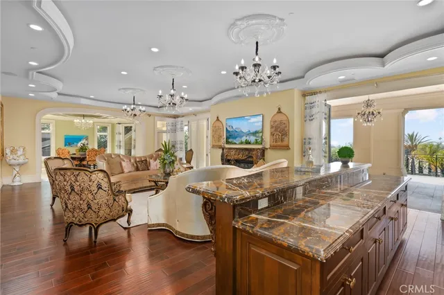 a view of a lobby with a flat screen tv and outdoor seating