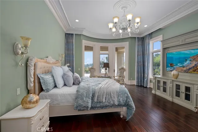 a view of kitchen with furniture and wooden floor