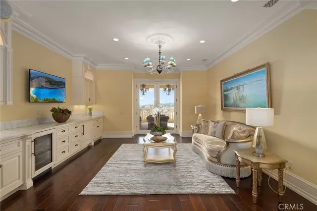 a spacious bedroom with a balcony a bed and a fireplace