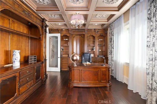 a view of entryway with a front door and wooden floor