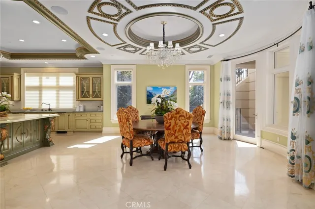 a kitchen with stainless steel appliances granite countertop a stove and a microwave