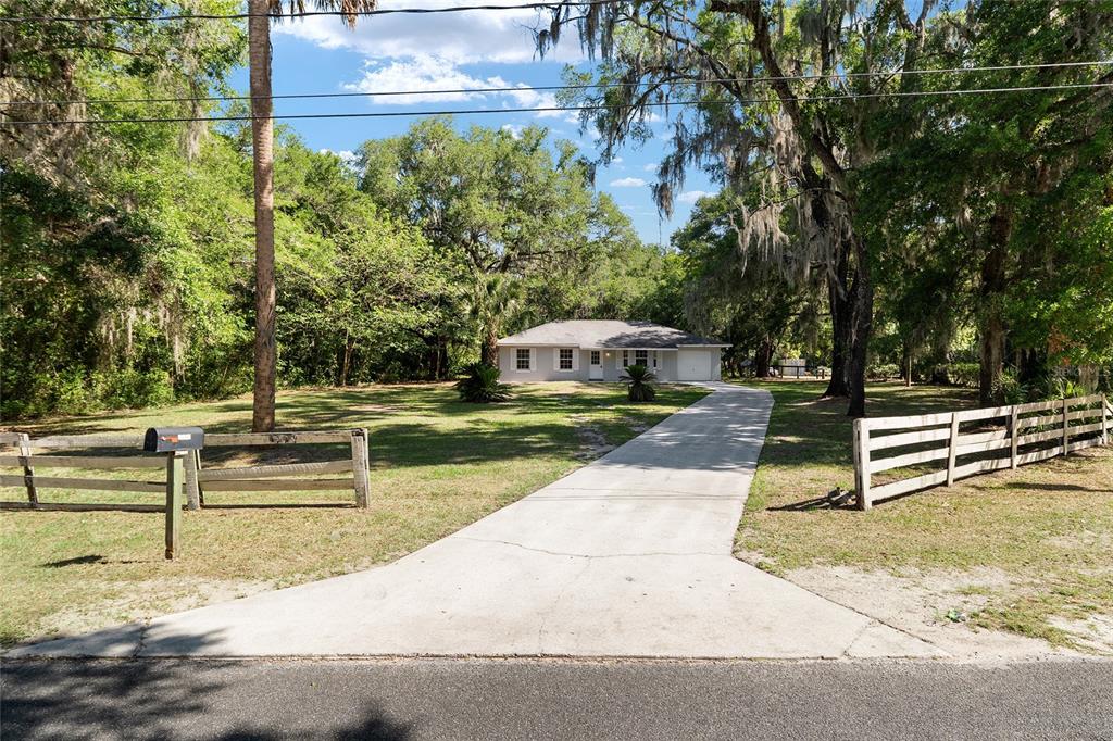4329 Northwest 155th Street Reddick, FL 32686 - Photo 2 of 52 a view of outdoor space and deck
