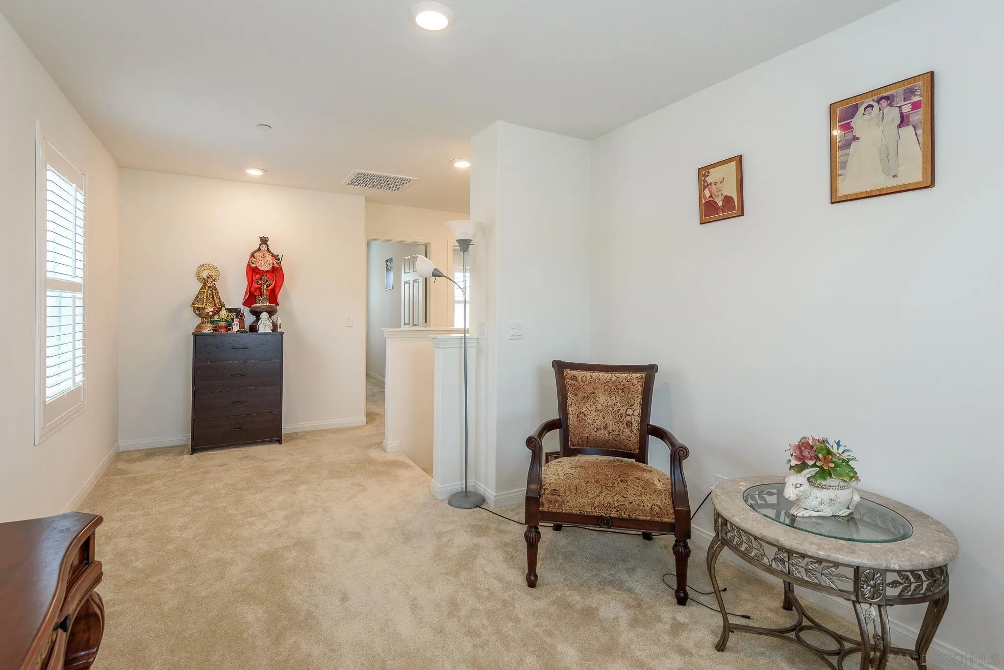 10761 Ensworth Way Spring Valley, CA 91978 - Photo 19 of 38 a living room with furniture and a couch