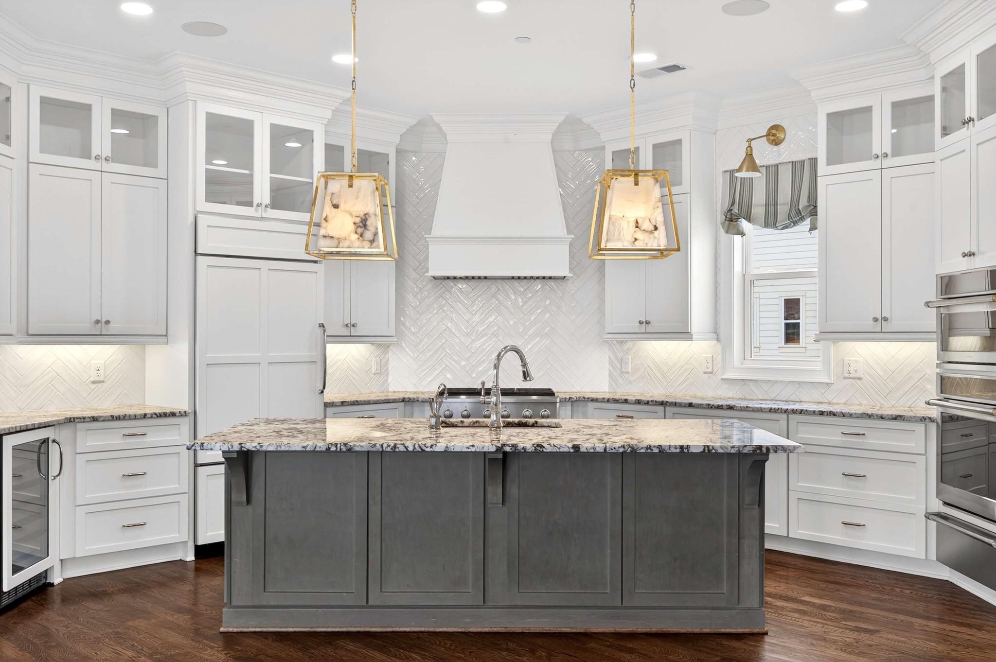 165 Front Street Franklin, TN 37064 - Photo 25 of 63 a kitchen with granite countertop a sink stainless steel appliances and cabinets