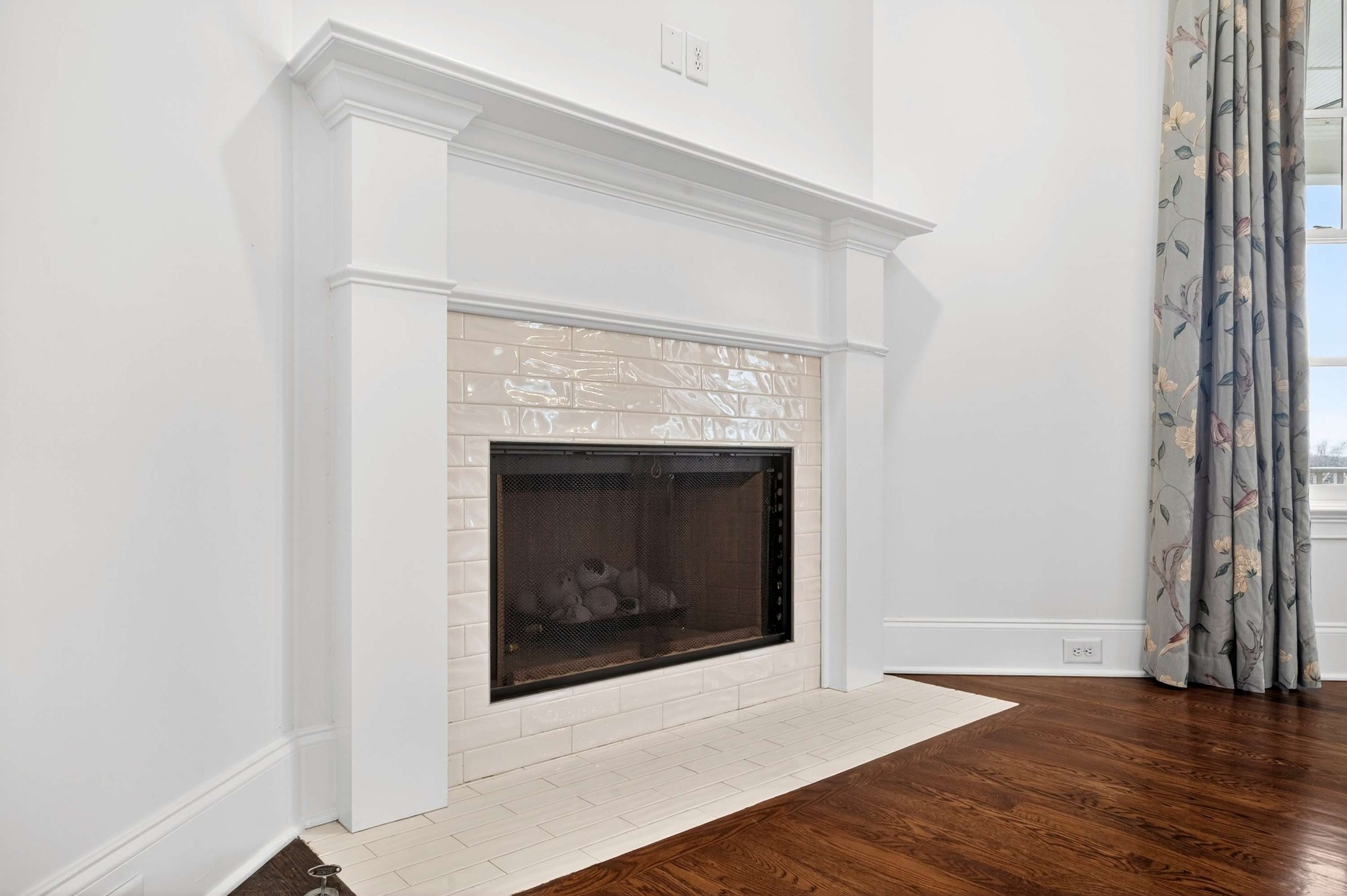 165 Front Street Franklin, TN 37064 - Photo 28 of 63 a view of an empty room with wooden floor and a window
