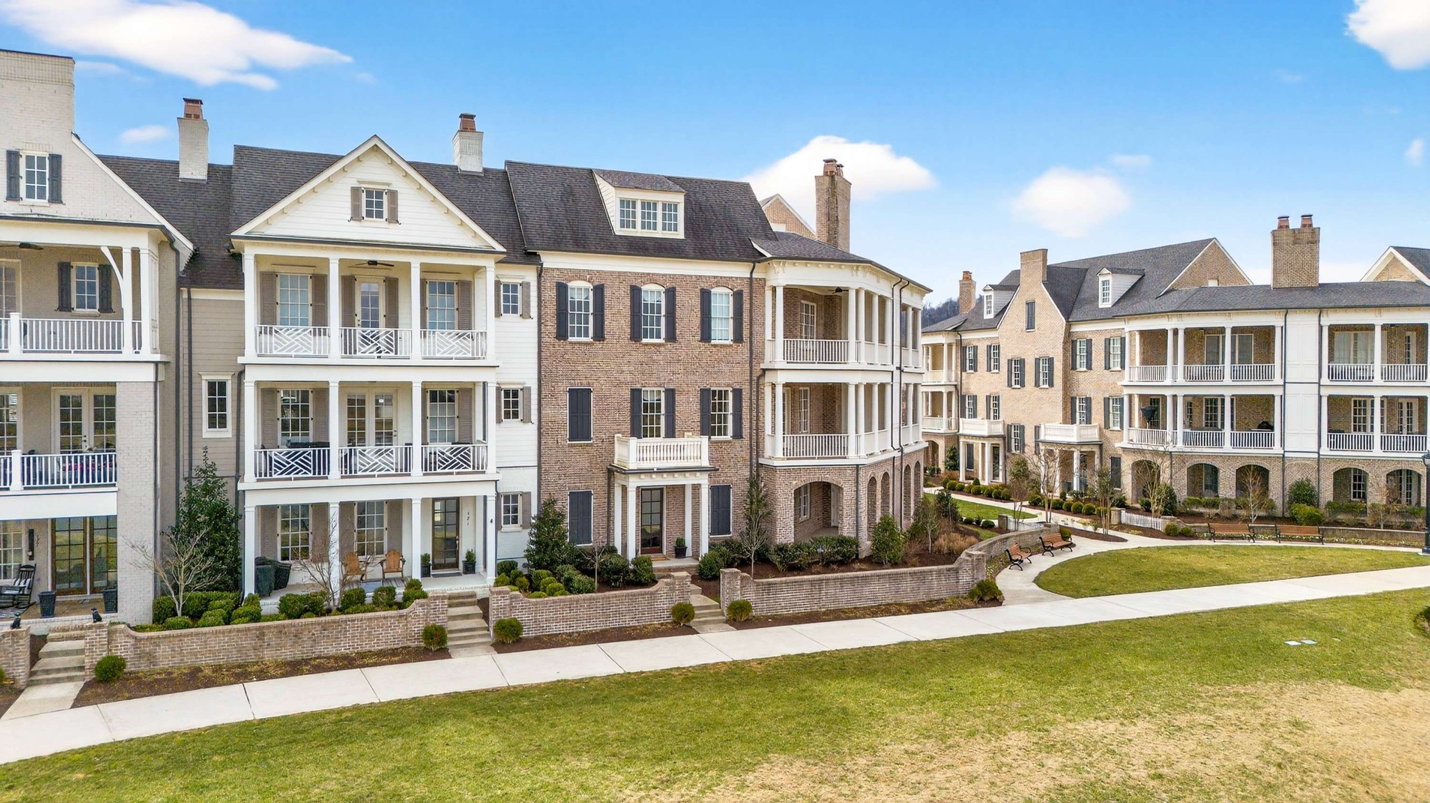 165 Front Street Franklin, TN 37064 - Photo 4 of 63 a front view of building with yard and parking