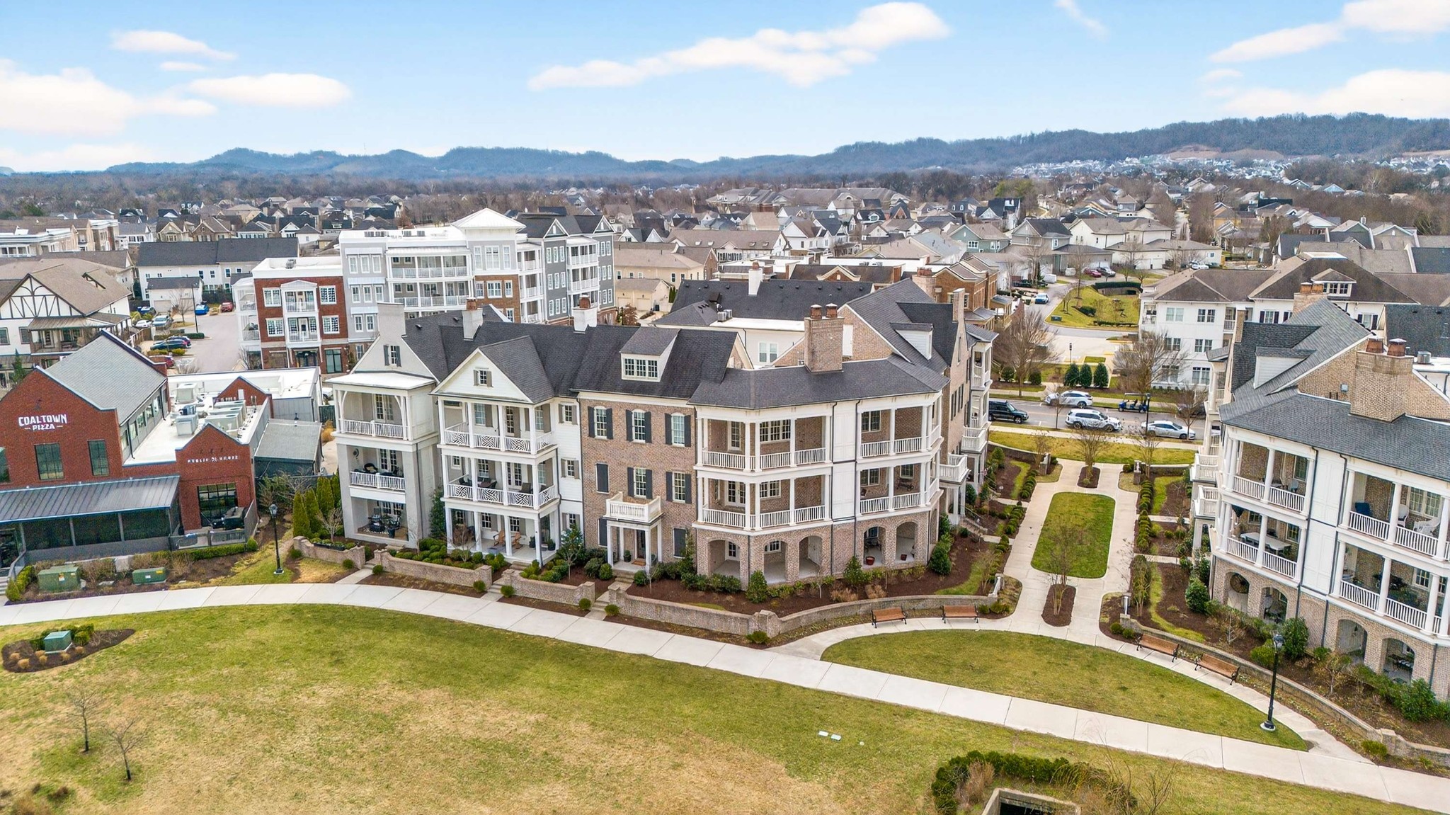 165 Front Street Franklin, TN 37064 - Photo 5 of 63 a view of a swimming pool with a mountain in the background