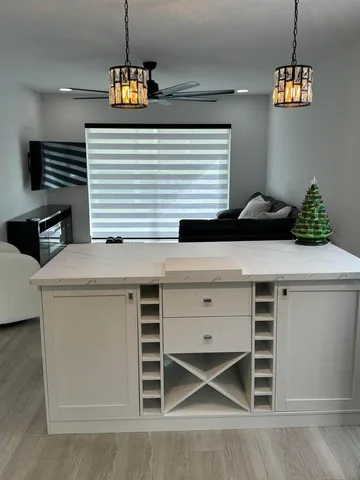 a kitchen with a stove and a microwave