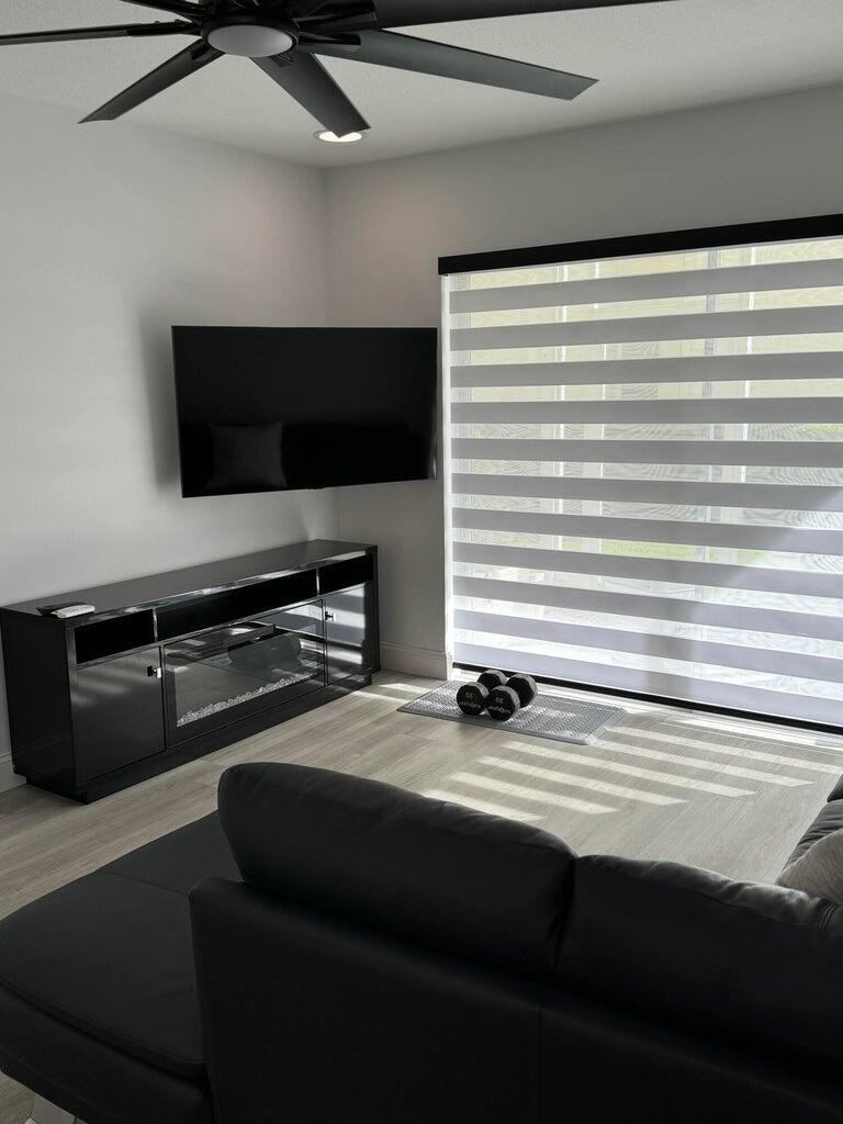 650 Snug Harbor Drive, Unit G110 Boynton Beach, FL 33435 - Photo 9 of 34 a kitchen with a refrigerator and a stove