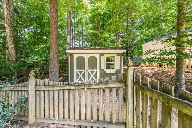 a house view with a garden space