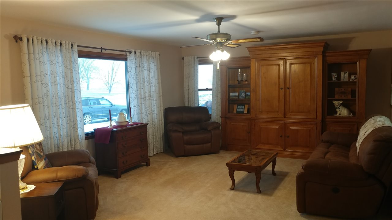 4625 Town Hall Road Belvidere, IL 61008 - Photo 8 of 25 a living room with furniture and a large window