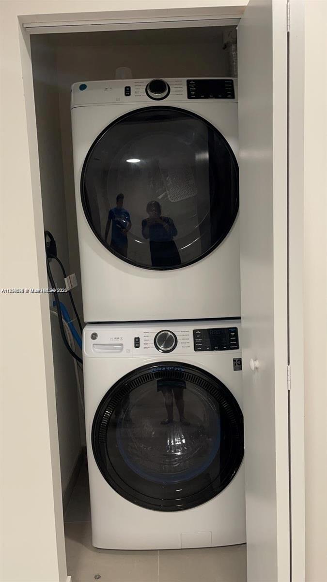 2505 Northeast 193rd Street, Unit 4204 Aventura, FL 33180 - Photo 18 of 18 a close up view of washer and dryer