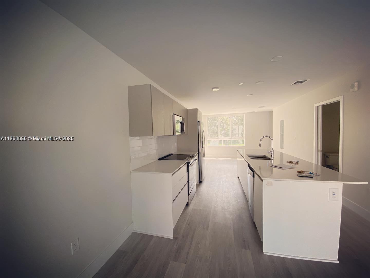2505 Northeast 193rd Street, Unit 4204 Aventura, FL 33180 - Photo 2 of 18 a view of a kitchen with a sink
