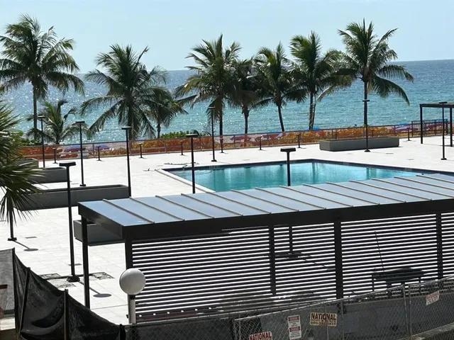 a view of outdoor space with swimming pool