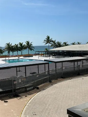 a view of a chairs and table on the terrace