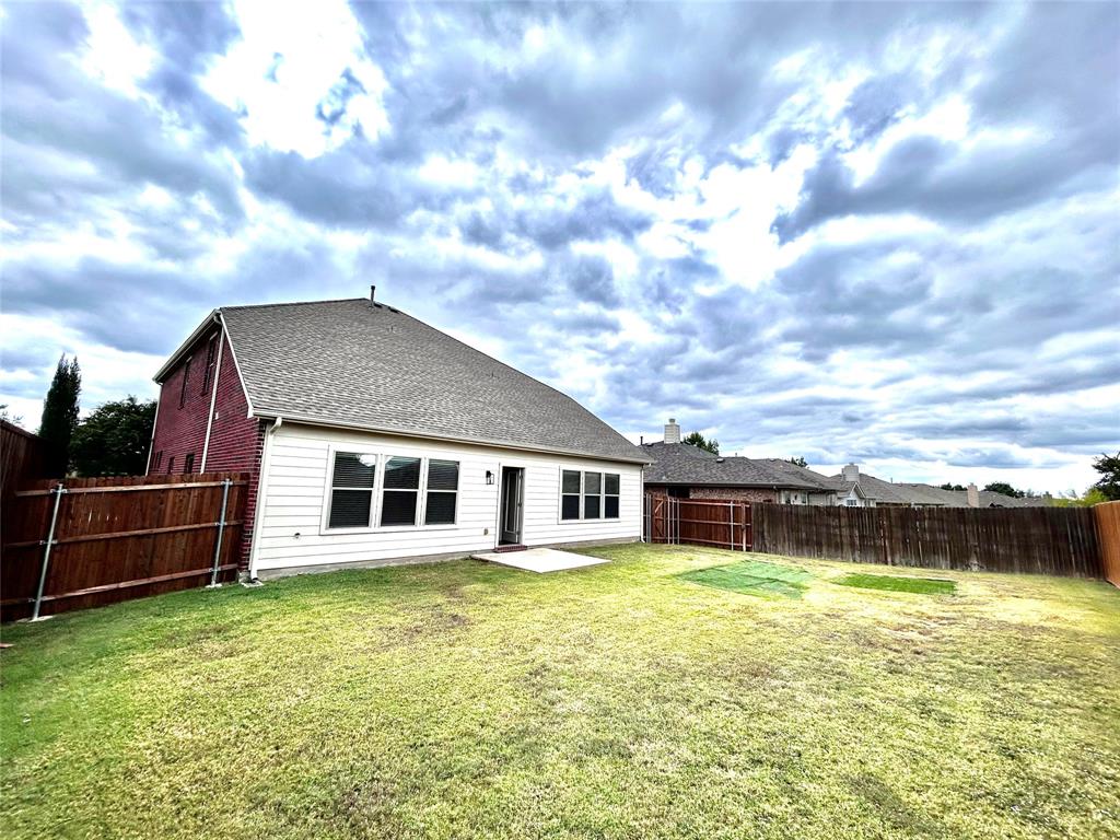 5112 Promised Land Drive McKinney, TX 75071 - Photo 28 of 30 a view of a house with a garden