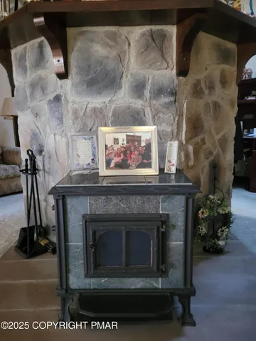 a bedroom with a bed and dresser