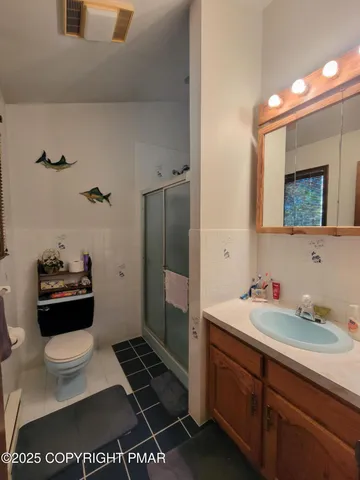 a bathroom with a sink and a toilet