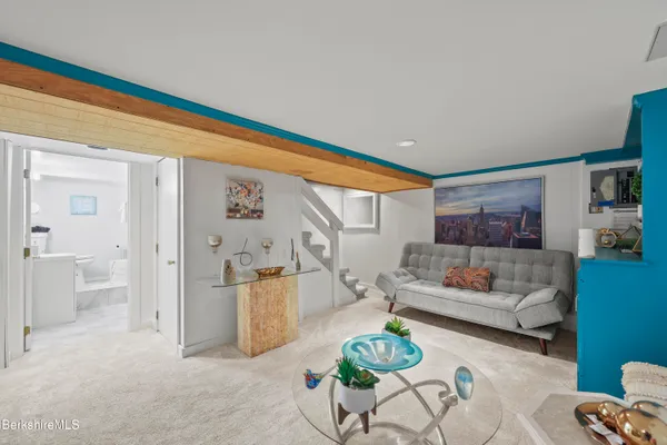 a living room with furniture and a table