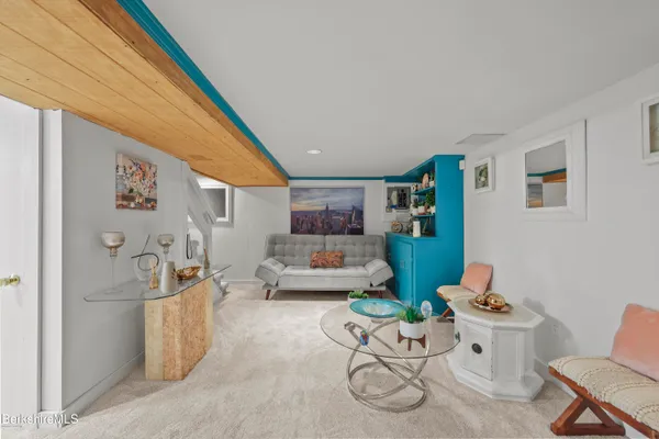 a living room with furniture and a table