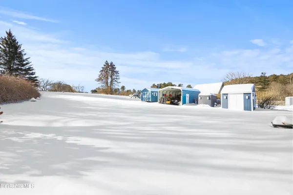 a terrace of a house with wooden floor