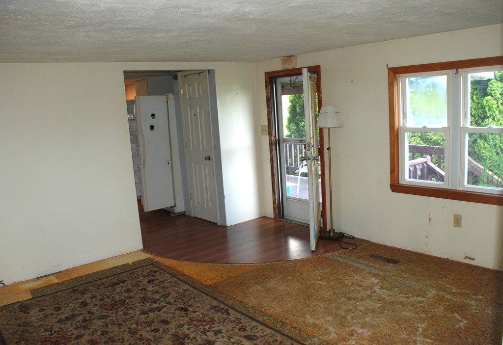 4659 South Mechanicsville Road Clarion, PA 16214 - Photo 17 of 35 an empty room with wooden floor and windows