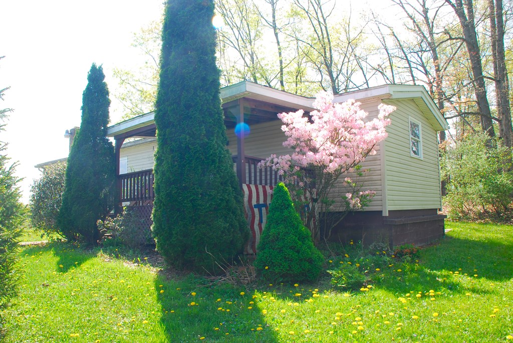 4659 South Mechanicsville Road Clarion, PA 16214 - Photo 2 of 35 a backyard of a house with lots of green space