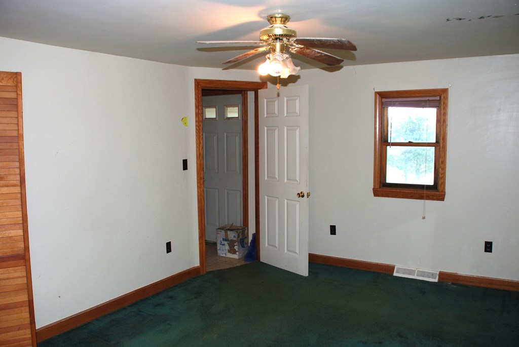 4659 South Mechanicsville Road Clarion, PA 16214 - Photo 21 of 35 wooden floor in an empty room with a window