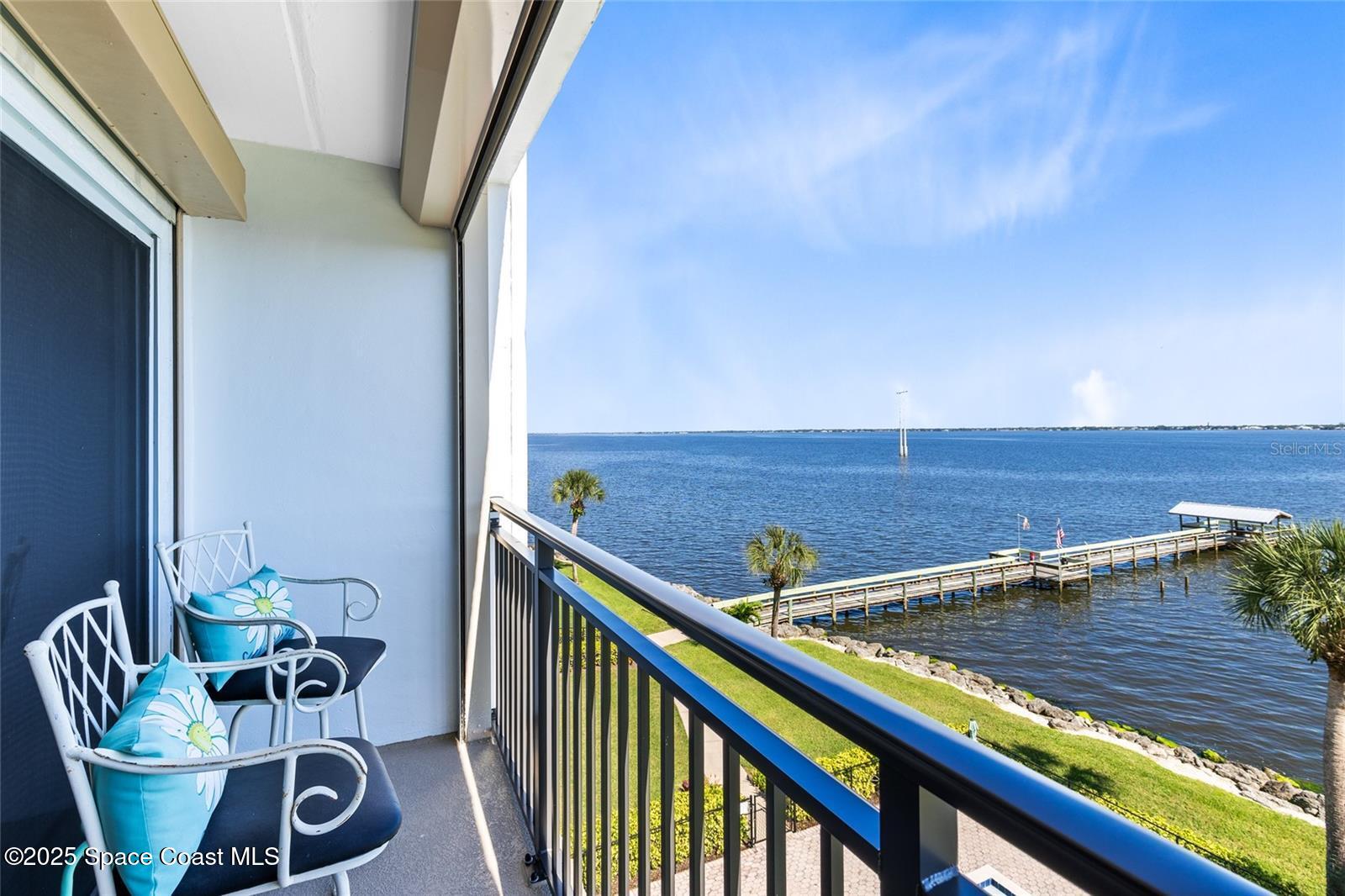 3901 Dixie Highway Northeast, Unit 409 Palm Bay, FL 32905 - Photo 23 of 40 a view of roof deck with chair and barbeque oven