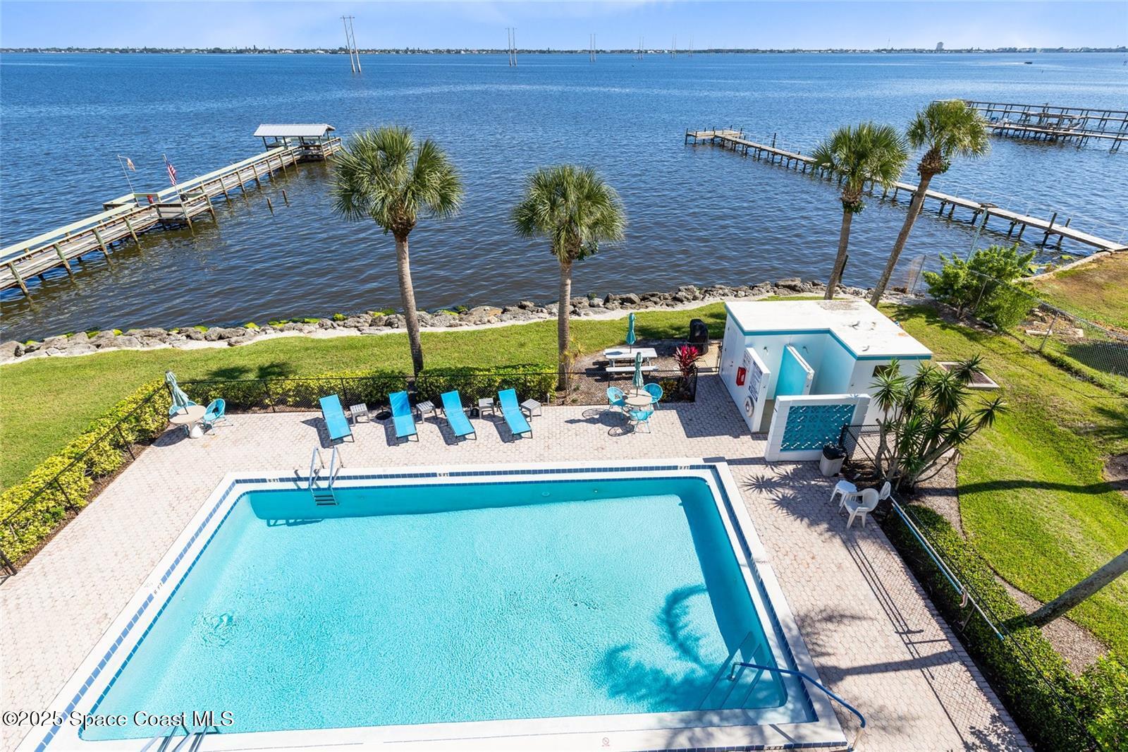 3901 Dixie Highway Northeast, Unit 409 Palm Bay, FL 32905 - Photo 25 of 40 a view of a backyard with sitting area