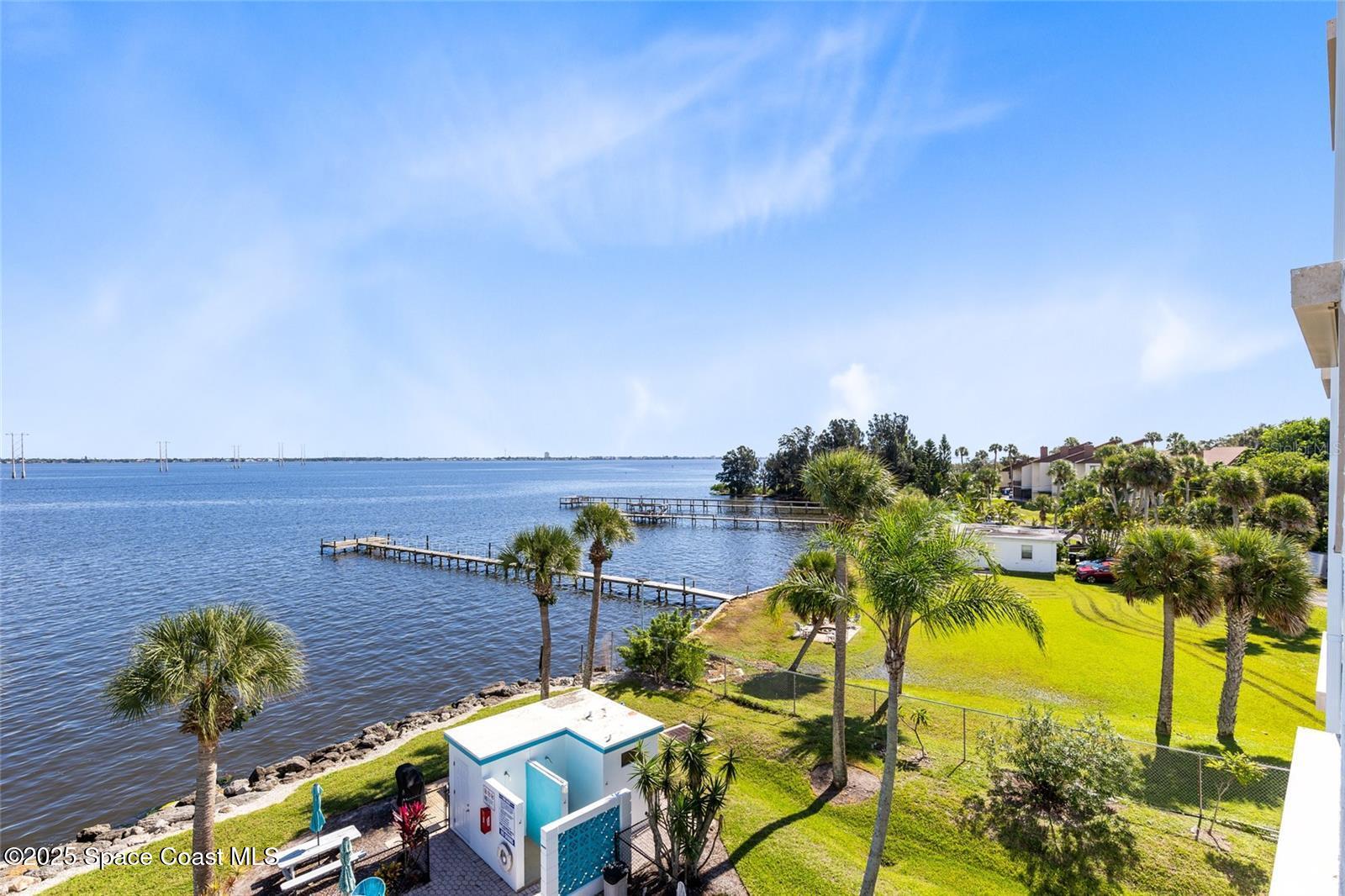 3901 Dixie Highway Northeast, Unit 409 Palm Bay, FL 32905 - Photo 28 of 40 an aerial view of a houses with swimming pool