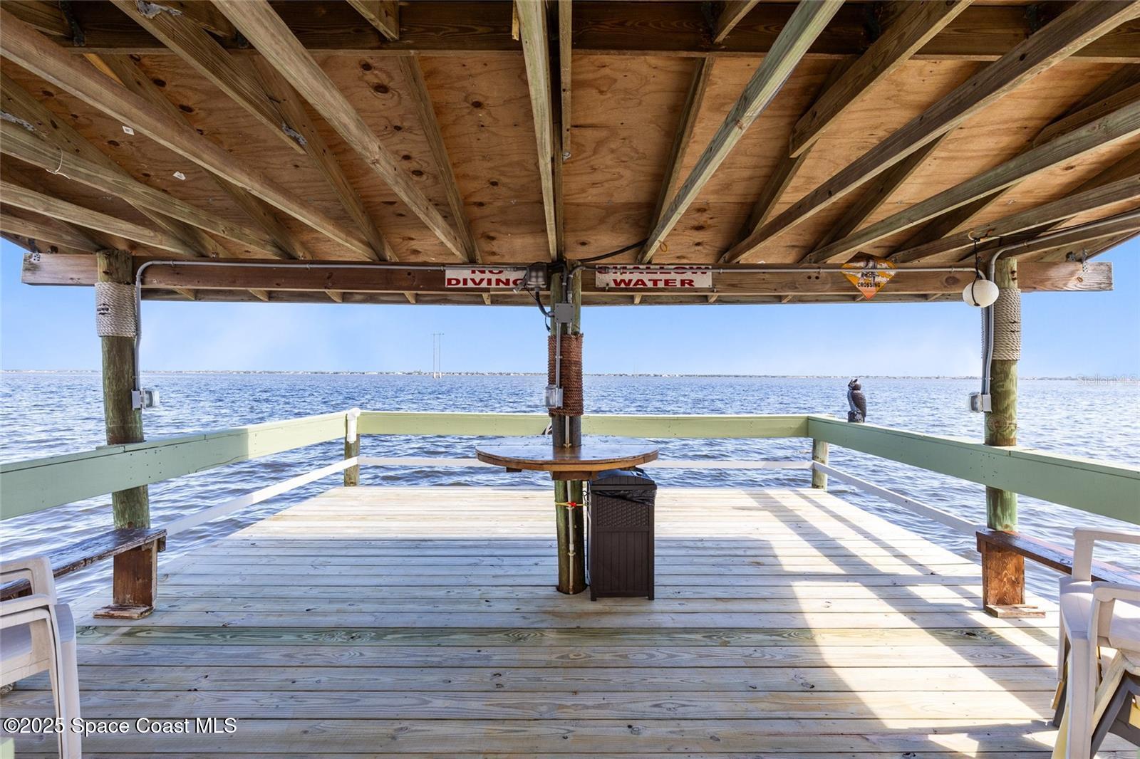 3901 Dixie Highway Northeast, Unit 409 Palm Bay, FL 32905 - Photo 32 of 40 a view of a balcony with wooden floor