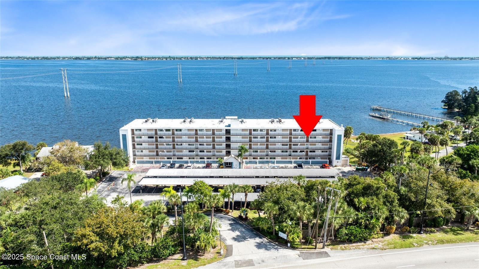 3901 Dixie Highway Northeast, Unit 409 Palm Bay, FL 32905 - Photo 35 of 40 a view of a city and an ocean