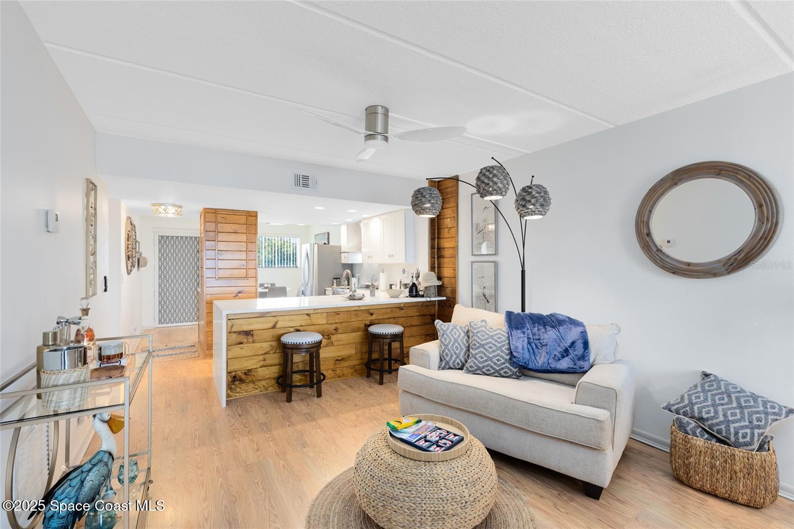 3901 Dixie Highway Northeast, Unit 409 Palm Bay, FL 32905 - Photo 8 of 40 a living room with furniture