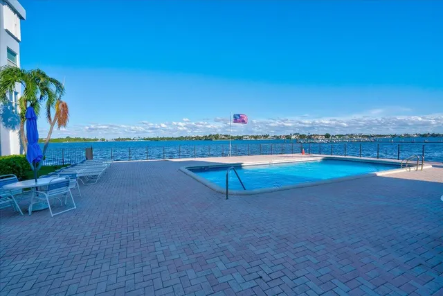 a view of outdoor space with swimming pool and patio
