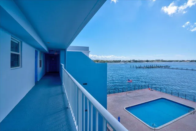 a view of a balcony with an ocean view