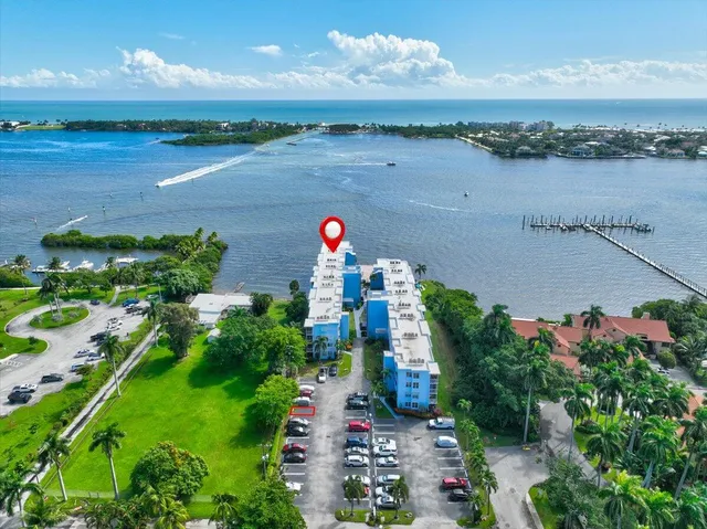 an aerial view of a houses with outdoor space