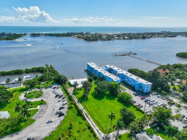 an aerial view of a house with a garden