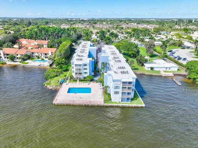 an aerial view of a house with a garden