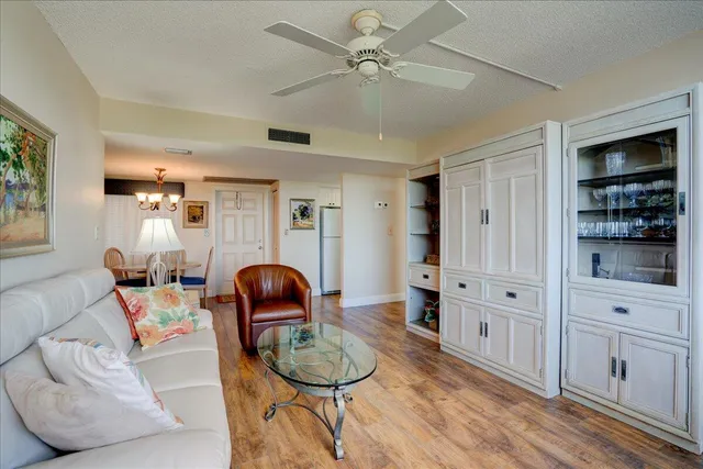 a room with furniture and wooden floor